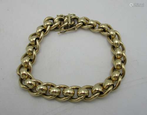A 9ct gold ladies bracelet with curb links and hoops, 45 g