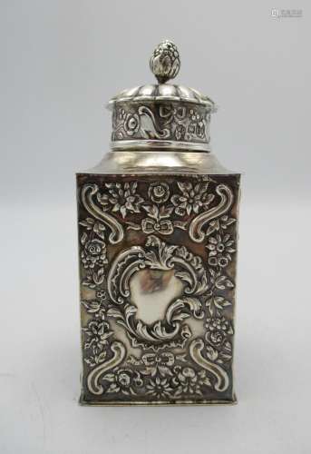 A Victorian silver tea caddy by William Comyns & Sons, London 1897, of rectangular form with