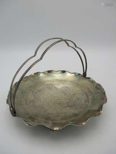 An early 20th century Chinese export silver basket, by Tackhing, with lobed double handle and