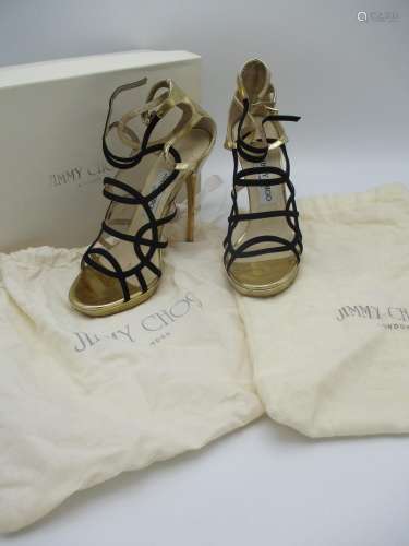 A pair of boxed Jimmy Choo ladies black leather and gold soled evening shoes, size 37.5, A/F (