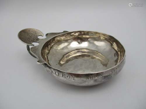 An early 19th century French silver porringer, with makers initials M/I?, the edge of the bowl