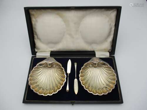 A cased pair of George V silver butter dishes by Harrison Brothers and Howson, Sheffield 1921,