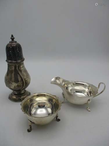 An Edwardian silver sugar caster by Harrison Brothers and Howson, London 1909, together with a mid