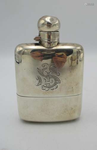 A late Victorian silver hip flask by James Dixon & Sons, Sheffield 1900, the front monogrammed J.