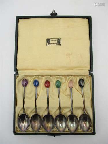 A cased set of six George V silver teaspoons by Liberty & co, Birmingham 1926, each with hardstone