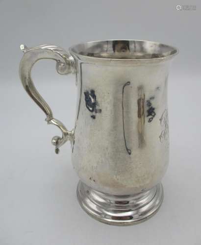 A George III silver tankard by William Stephenson, London 1793, with baluster body and c scroll