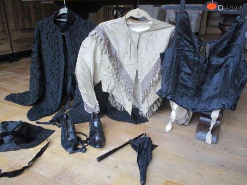 A group of Victorian ladies clothing and later to include a black cape with an applique needlework