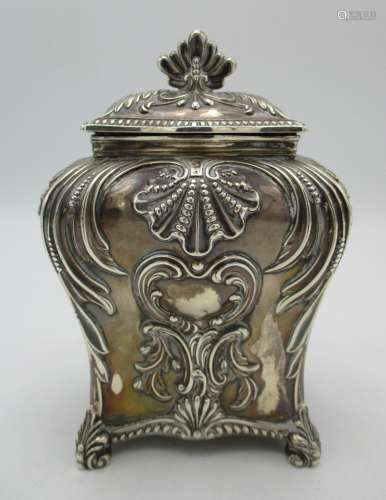 A Victorian silver tea caddy by Thomas Bradbury & Sons, London 1894, of bombe form with repousse