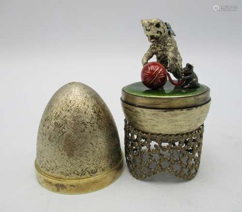 A Stuart Devlin novelty silver gilt surprise egg, London 1986, the inside revealing a cat and