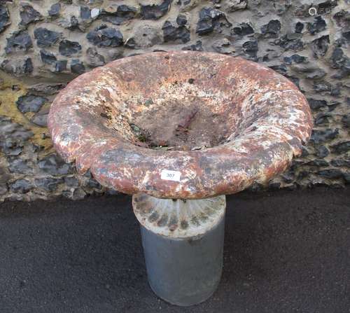 A Victorian part painted cast iron garden planter, the shallow bowl with a shaped, foldover rim,