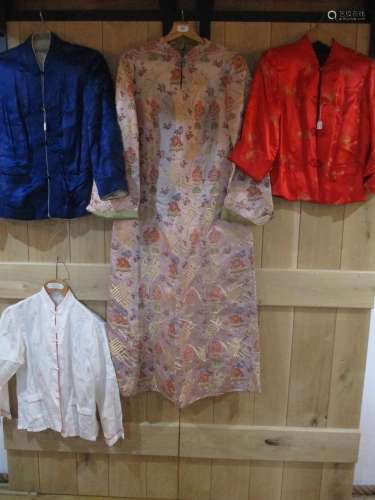 Four items of mid to late 20th century Chinese export clothing to include two silk jackets, an