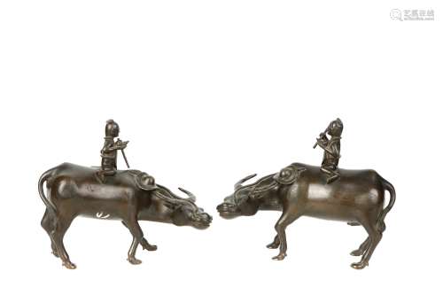 pair of chinese bronze statues of cattles and boys