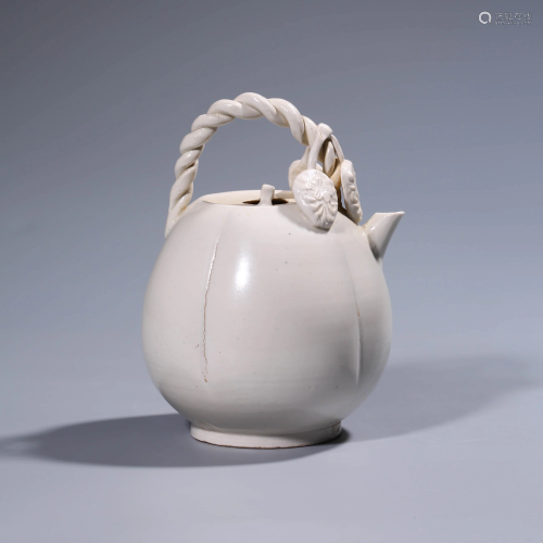 A Ding Kiln Moulded Porcelain Ewer