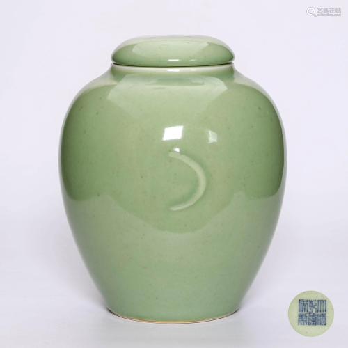 A Celadon-glazed Porcelain Jar With Cover