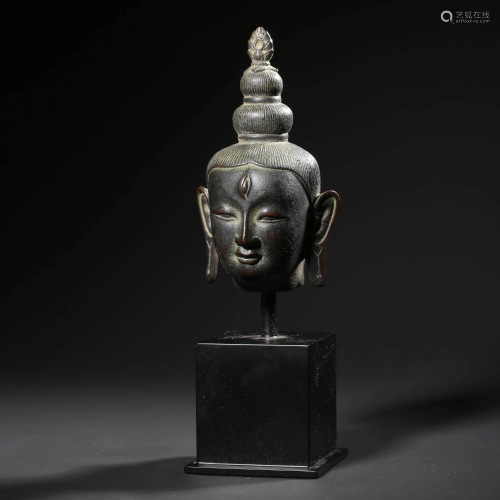 A Bronze Buddha Head Statue