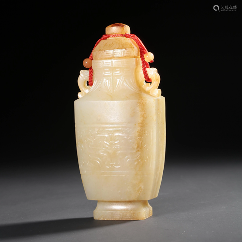 A White Jade â€˜Tao Tieâ€™ Vase With Double Ears