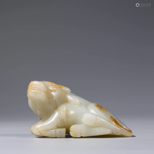 A Carved Jade Cattle Pendant