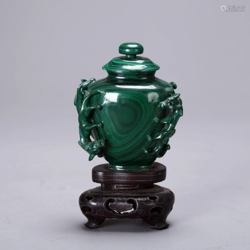 A Jade Snuff Bottle with wood stand