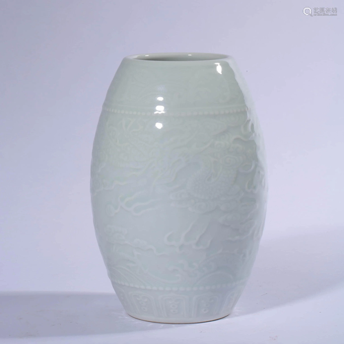 A Carved White Glazed Porcelain Drum-shaped Jar