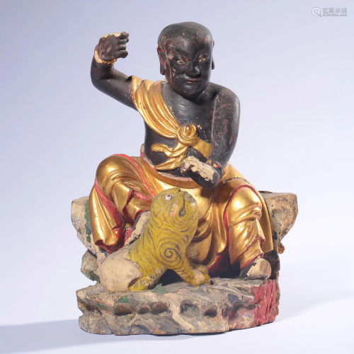 A Gilt Wood Carved Sitting Luohan Statue