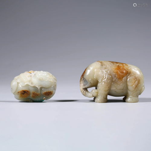 A set of Carved Jade Elephant Pendant