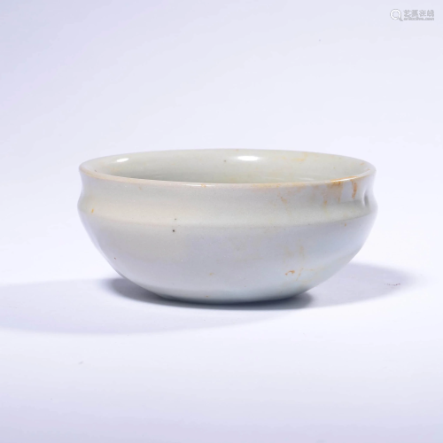 A Glazed Porcelain Cup