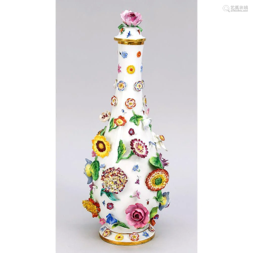 Bottle vase with flowers and i