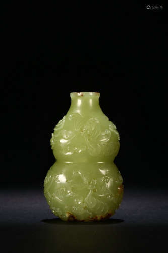 A Hetian Topaz Snuff Bottle Represents 