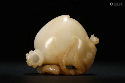 Backflow: A Hetian Jade Carving with Design of A Monkey Presenting Peaches