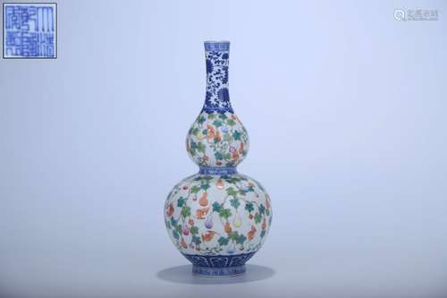 A Gourd-shaped Famille-rose Blue-and-white Vase  with the Imperial Mark of Qianlong Reign in the Eighteenth Century