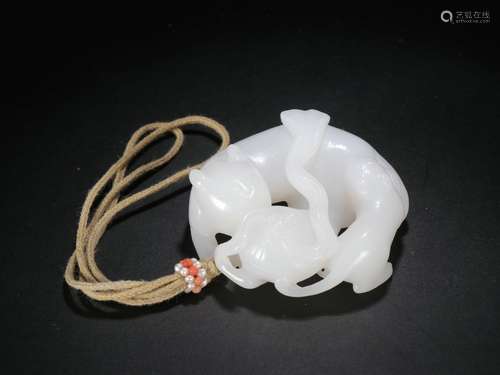 Old Collection ：A Hetian White Jade Piece with Beast Design