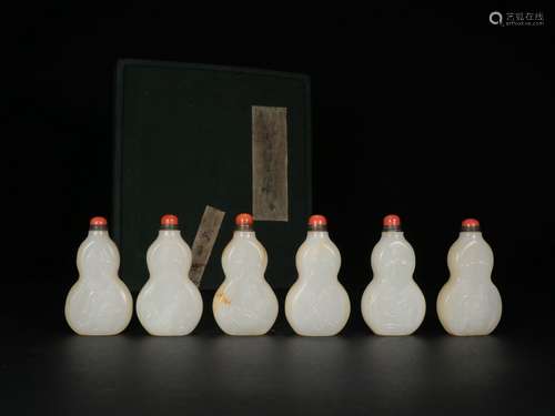 A Set Of Hetian Jade Snuff Bottle with Design of Erotica Graphics During  Qianlong reign, in the Seventeenth Century