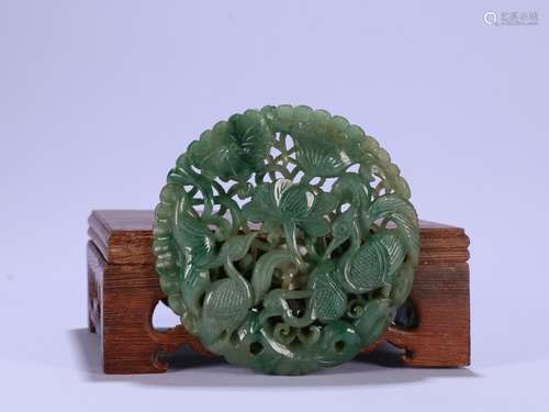 Seventeenth Century：A Jadeite Bi with Egret and Lotus Pattern