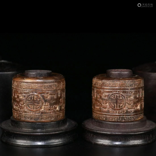 A PAIR OF ANCIENT CHINESE CHENXIANG WOOD RINGS