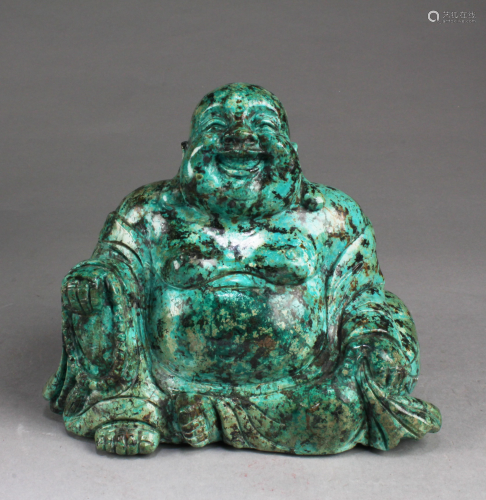 A Turquoise Smiling Buddha Statue