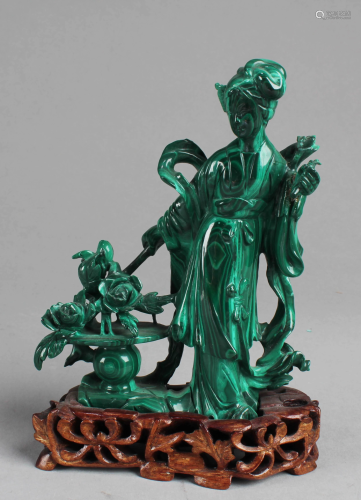 A Carved Malachite Fingurine With stand