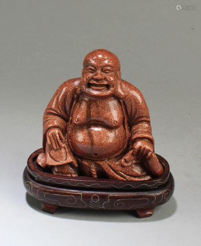 A Carved Gold Crystal Smiling Buddha Statue