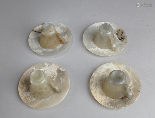 A Set of Four Antique Jadestone Teacups with Saucers