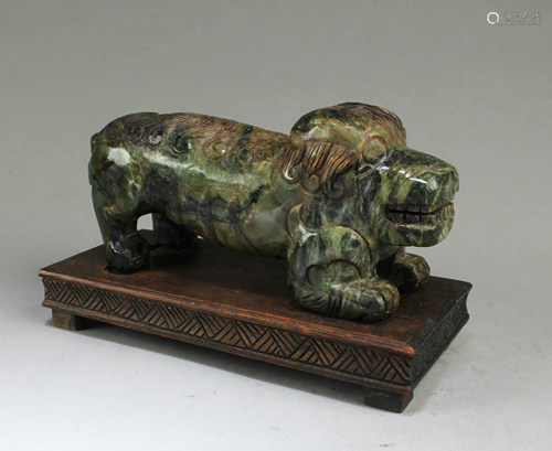 A Carved Mythical Beast Jade Figurine