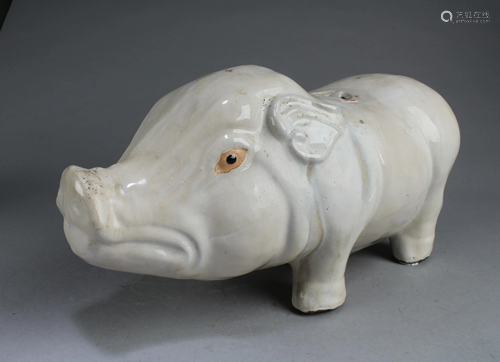 A Porcelain Pig Figurine