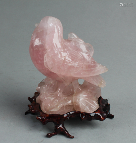 A Carved Lavender Crystal Bird Figurine