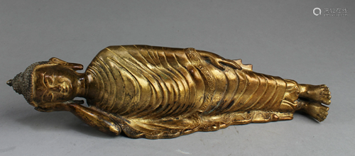 A Gilt Bronze Sleeping Buddha Statue