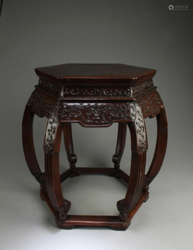 A Carved Wooden Hexagonal Shaped Stool