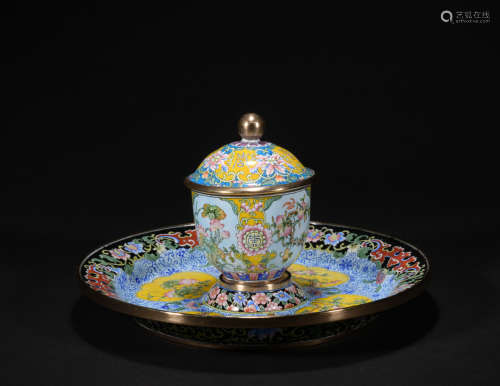 A enamel 'floral' tea cup and holder,Qing dynasty