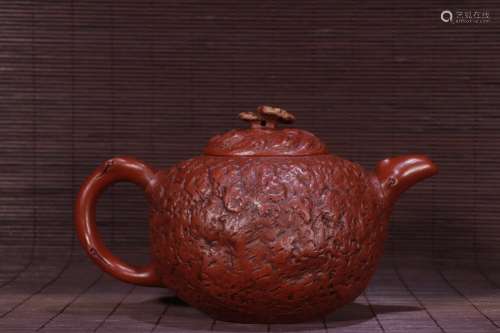 A Chinese Zisha Tea Pot With Ganoderma