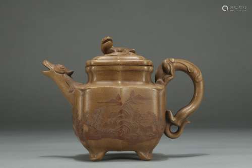 A Chinese Zisha Tea Pot With Mountain Shape