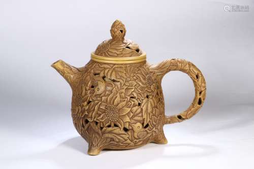 A Chinese Zisha Tea Pot With Flower Pattern