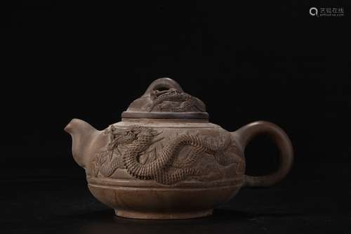 A Chinese Zisha Tea Pot With Dragon Pattern