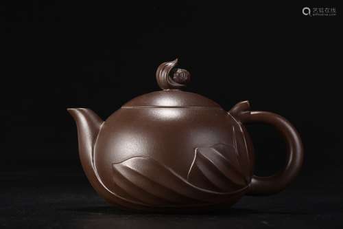 A Chinese Zisha Tea Pot With Lotus Pattern