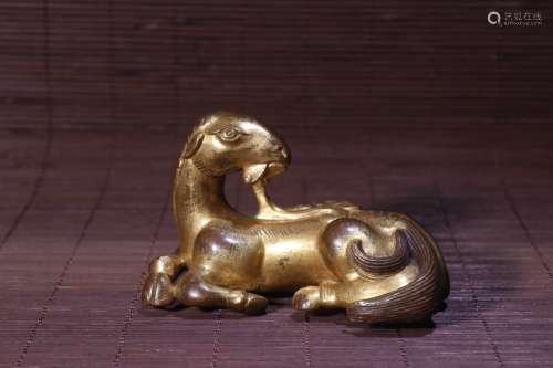 A Chinese Gilt Bronze Beast Carving Paperweight